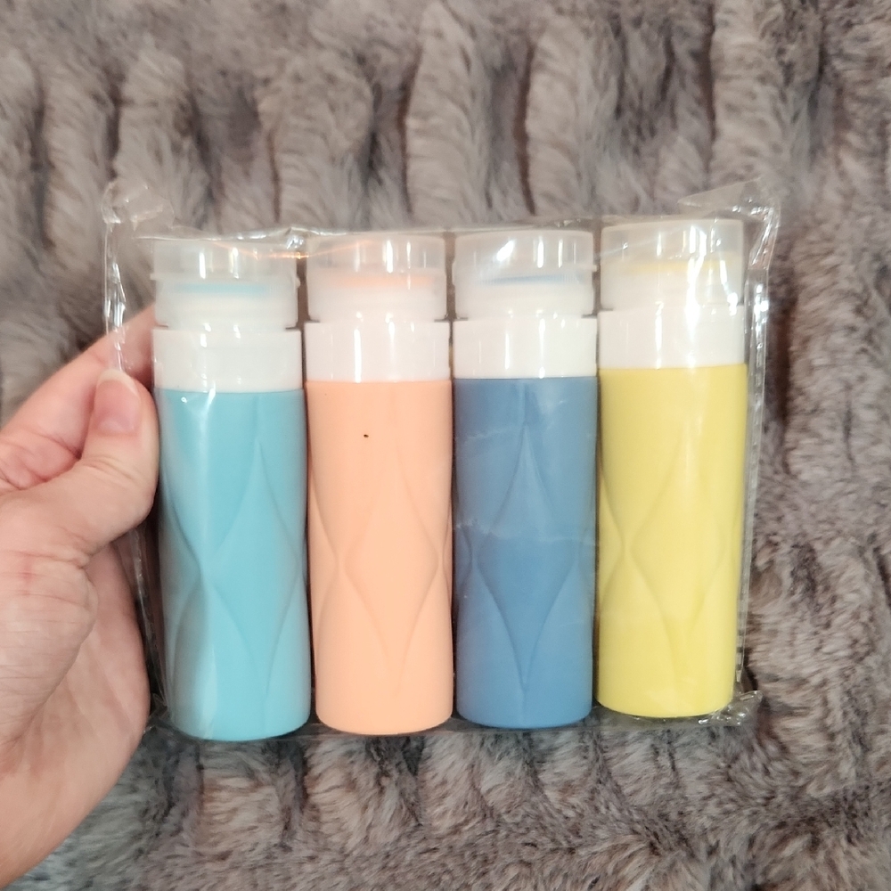 Set of Four Travel Bottles